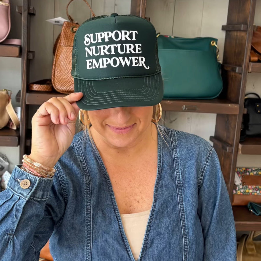 Support. Nurture. Empower. Trucker Hat